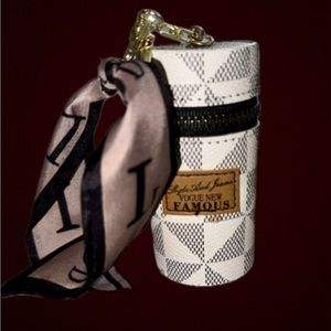 White and gray keychain lipstick holder